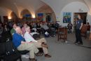 Cees Bremmer and Ed Eggink are listening to Peter Posner